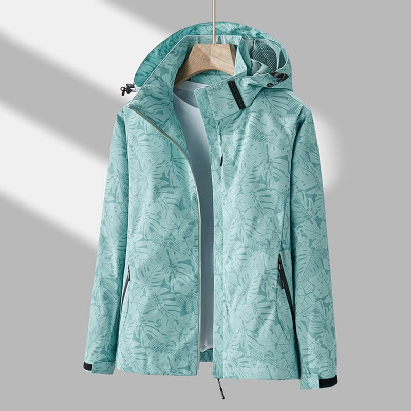 Amara Regenjacke mit Kapuze in Türkis mit Blätterprint, Vorderansicht