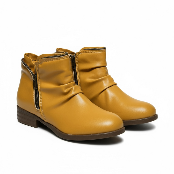 Sabine Ankle Boots in Gelb, Paaransicht schräg von vorne